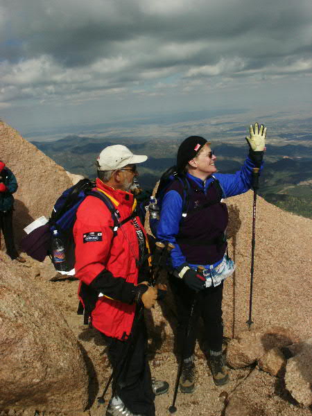 Larry and Pat near the top, Pat waves to crew at the last check point
